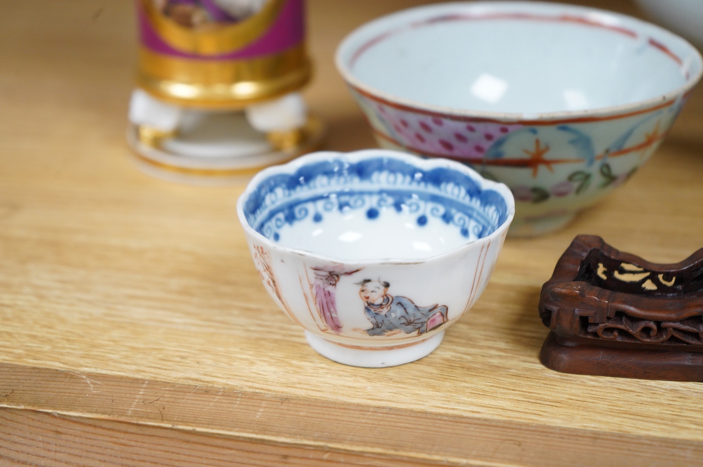 An 18th/19th century Chinese tea bowl and saucer, a punch bowl, two tea bowls and a Paris porcelain vase, largest 31cm